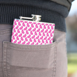 a pink and white background with a pattern hip flask