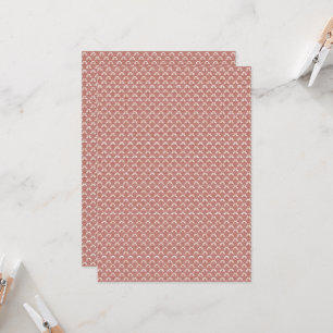 a pink and white background with a pattern invitation