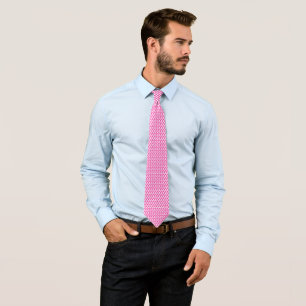 a pink and white background with a pattern tie
