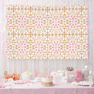 a pink and white flower pattern on a brown backgro banner