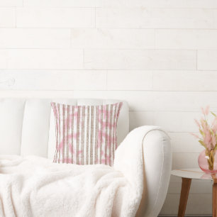 a pink and white striped background cushion