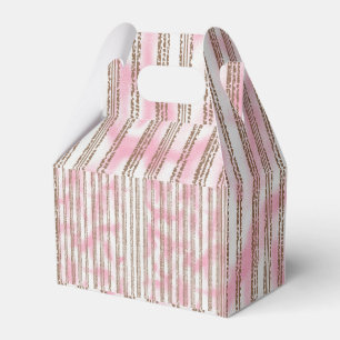 a pink and white striped background favour box