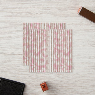a pink and white striped background loyalty card