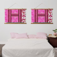 a pink and white wallpaper with a cross on it
