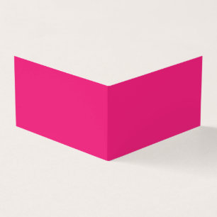 a pink background with a black border