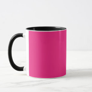 a pink background with a black border mug