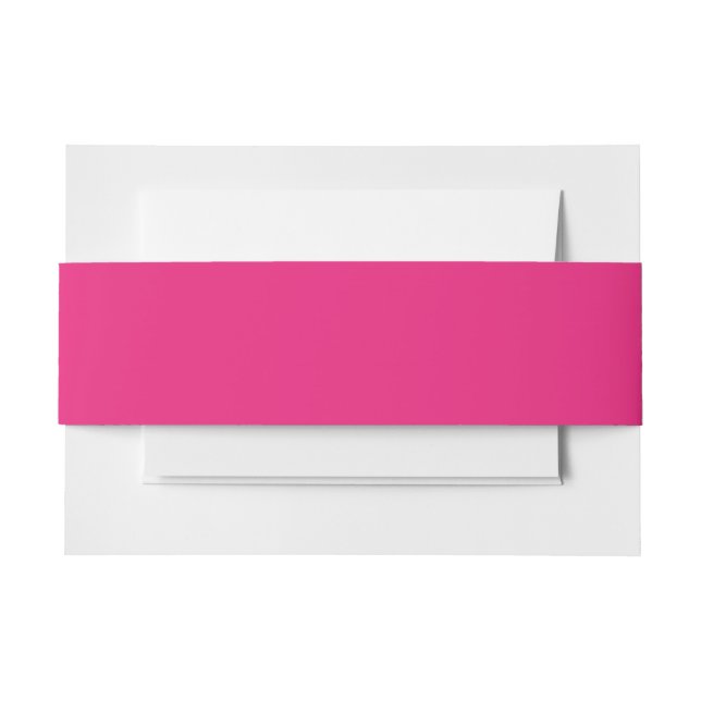 a pink background with a black invitation belly band (Front Example)