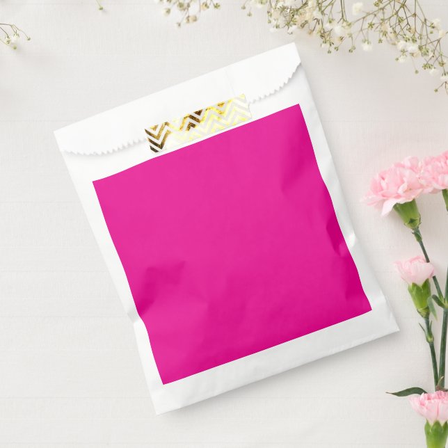 a pink background with a  favour bags (Sealed)