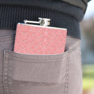 a pink background with a pattern in the middle_ hip flask