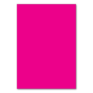 a pink background with a  table number