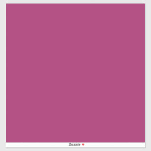 a pink background with a white