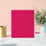a pink background with a white border acrylic sign<br><div class="desc">The design is a large blue square, which appears to be a bright and clear sky. The colour of the sky is a deep shade of blue, giving it a vibrant and lively appearance.</div>
