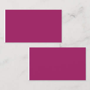 a pink background with a white border calling card