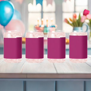 a pink background with a white border can glass
