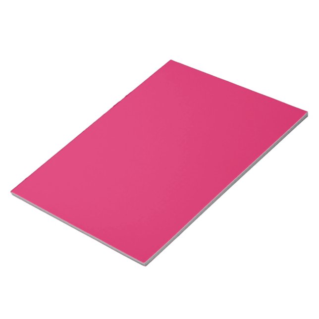 a pink background with a white border notepad (Angled)