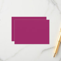 a pink background with a white