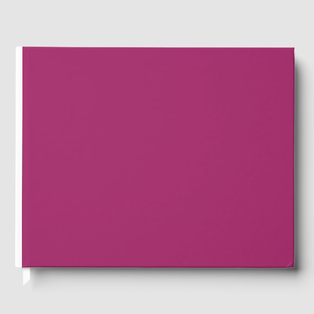 a pink background with a white guest book (Front)