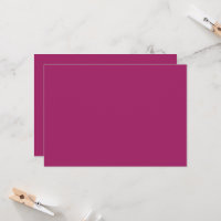 a pink background with a white
