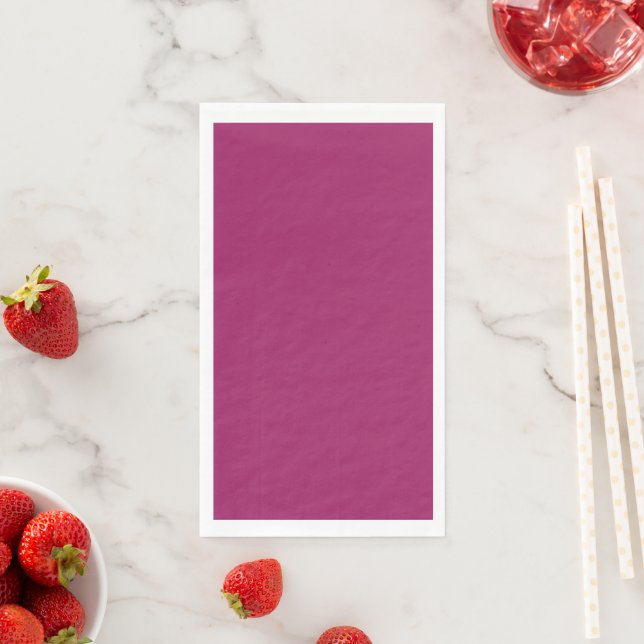 a pink background with a white napkin (Insitu)
