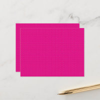 a pink background with white polka dots