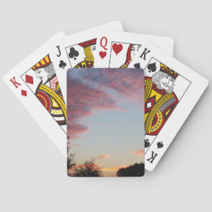 a pink, blue and purple sunrise playing cards