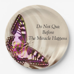 A pink butterfly on a cream satin background paper plate