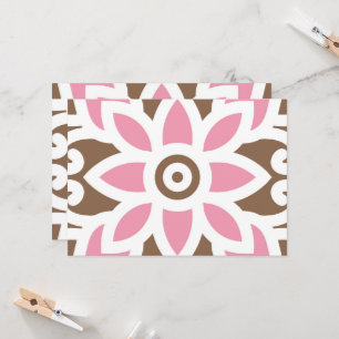 a pink flower on a brown background invitation
