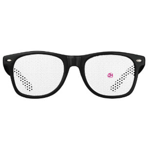 A pink flower with black spots on its petals, show retro sunglasses