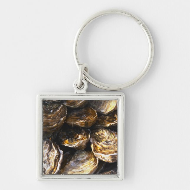A plate of oysters. key ring (Front)
