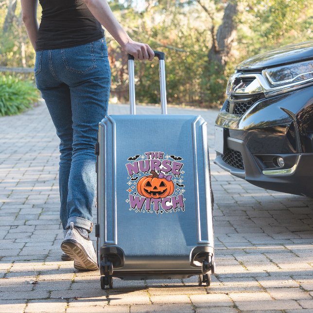 A playful design featuring a pumpkin witch with a  (Suitcase Insitu)