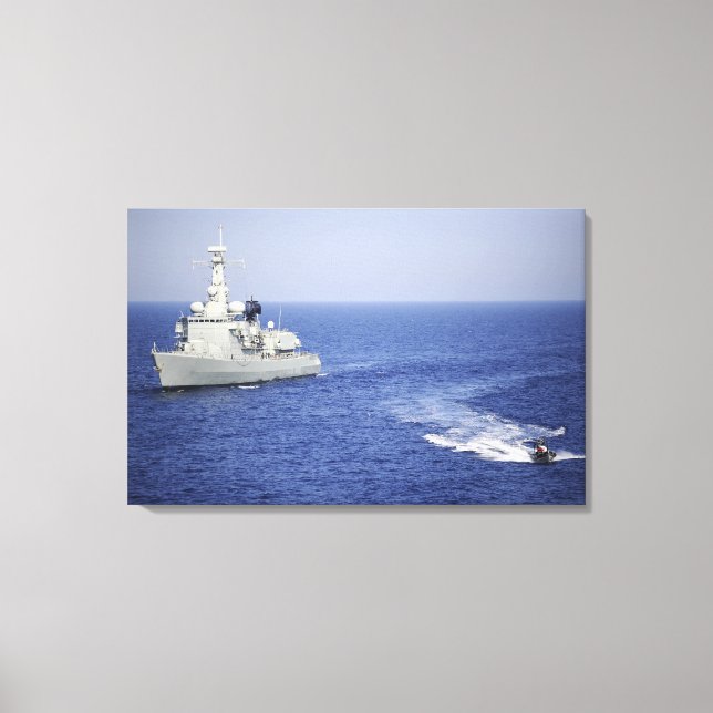 A Portuguese navy team in an inflatable boat Canvas Print (Front)