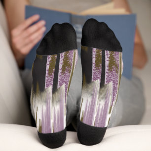 A pristine lake nestled among snow-capped mountain socks