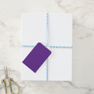 a purple background with a white border gift tags