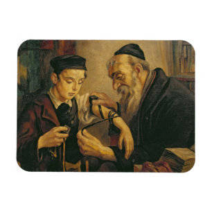 A Rabbi tying the Phylacteries to the arm of a boy Magnet