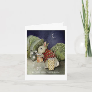 A rabbit enjoys a snack card