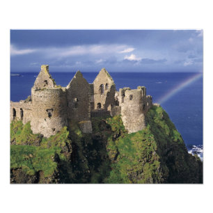 A rainbow strikes mediaeval Dunluce Castle on Photo Print
