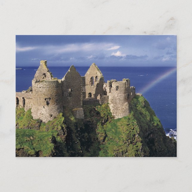A rainbow strikes mediaeval Dunluce Castle on Postcard (Front)