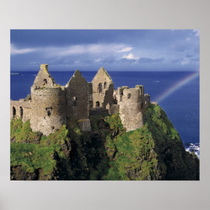 A rainbow strikes mediaeval Dunluce Castle on Poster