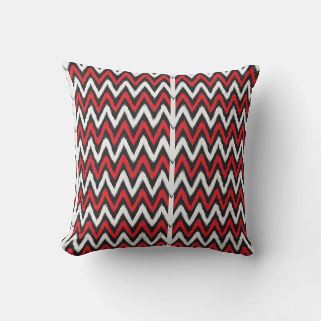 a red and black zigzag pattern on a white backgrou cushion (Front)