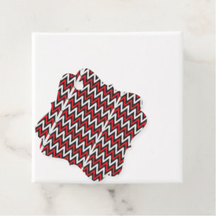 a red and black zigzag pattern on a white backgrou favour tags