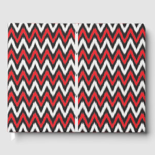 a red and black zigzag pattern on a white backgrou guest book