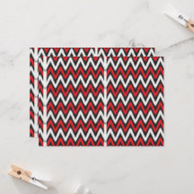 a red and black zigzag pattern on a white backgrou