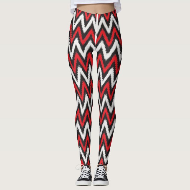 a red and black zigzag pattern on a white backgrou leggings (Front)