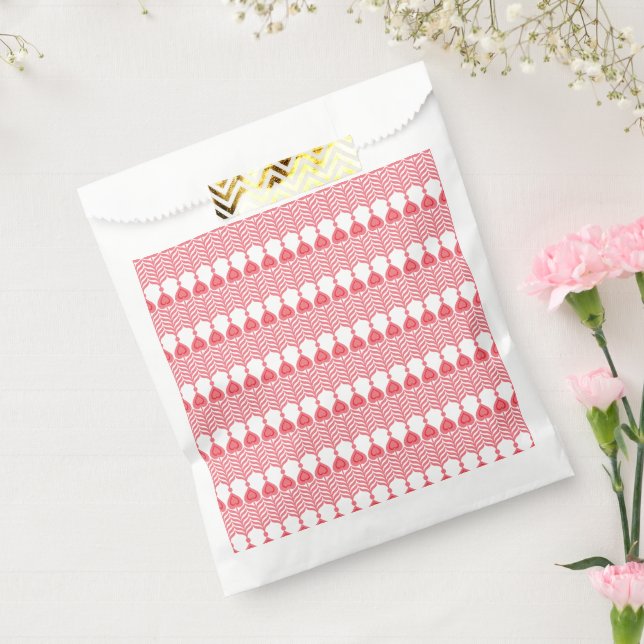 A red and pink geometric pattern featuring interlo favour bags (Sealed)