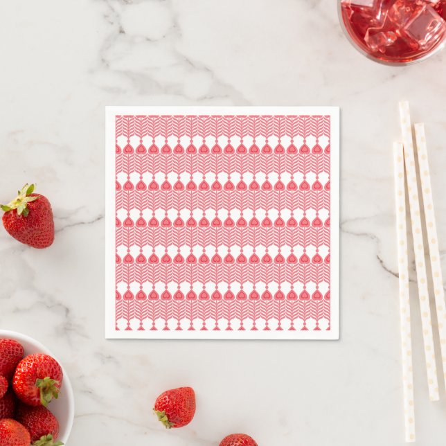 A red and pink geometric pattern featuring interlo napkin (Insitu)