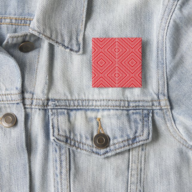 a red and white background with a diamond pattern 15 cm square badge (In Situ)