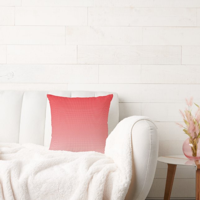 a red and white background with small squares cushion (Couch)