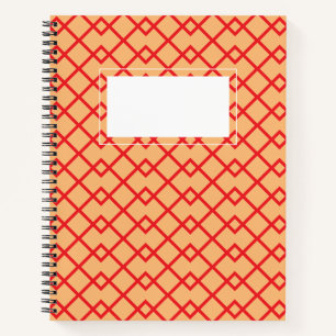 A red and white grid notebook