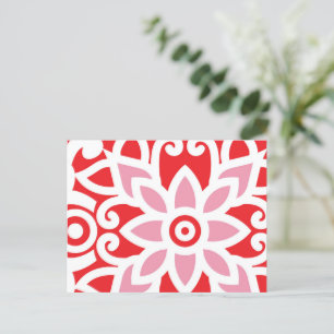 a red and white pattern with a flower on it postcard