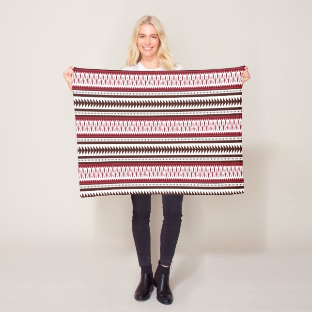 a red and white striped pattern fleece blanket (In Situ)